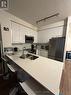 423 - 50 Thomas Riley Road, Toronto, ON  - Indoor Photo Showing Kitchen With Stainless Steel Kitchen With Double Sink 