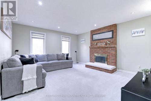 17 Sheringham Street S, Brampton, ON - Indoor Photo Showing Living Room With Fireplace