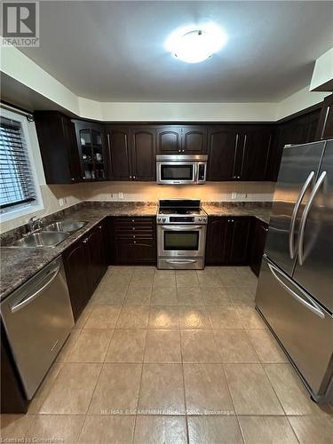 25 Newport Crescent, Hamilton, ON - Indoor Photo Showing Kitchen With Double Sink