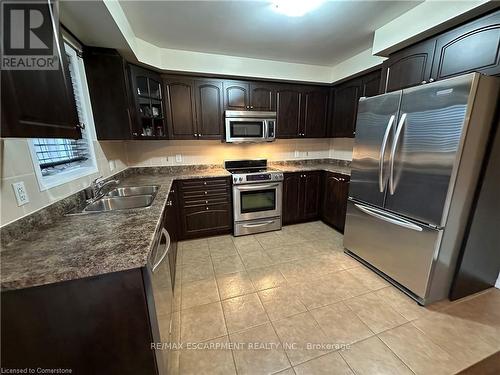 25 Newport Crescent, Hamilton, ON - Indoor Photo Showing Kitchen With Double Sink