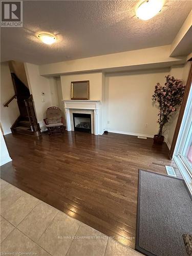 25 Newport Crescent, Hamilton, ON - Indoor With Fireplace