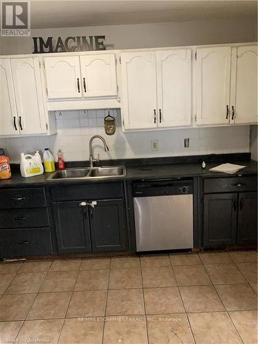 98 East 18Th Street W, Hamilton, ON - Indoor Photo Showing Kitchen With Double Sink