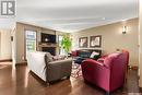 3605 Green Cedar Court, Regina, SK  - Indoor Photo Showing Living Room With Fireplace 