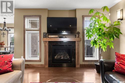 3605 Green Cedar Court, Regina, SK - Indoor Photo Showing Living Room With Fireplace