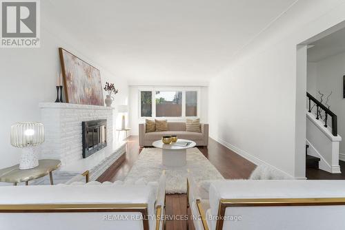 54 Orphir Road, Hamilton, ON - Indoor Photo Showing Living Room With Fireplace