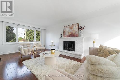 54 Orphir Road, Hamilton, ON - Indoor Photo Showing Living Room With Fireplace