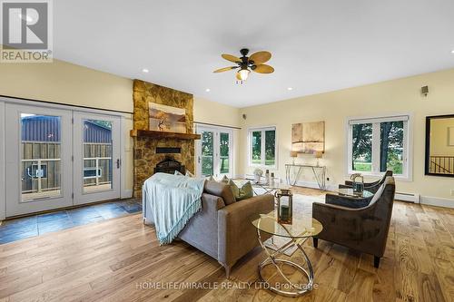 556389 Mulmur Melancthon Town Line, Mulmur, ON - Indoor Photo Showing Living Room With Fireplace