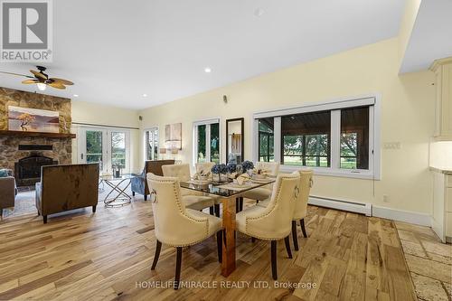 556389 Mulmur Melancthon Town Line, Mulmur, ON - Indoor Photo Showing Dining Room With Fireplace