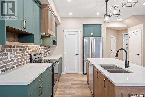 2940 Welby Way, Regina, SK - Indoor Photo Showing Kitchen With Double Sink With Upgraded Kitchen