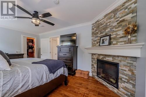 10 Brookfield Road, St. John'S, NL - Indoor Photo Showing Bedroom With Fireplace