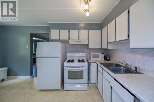 7443 S Kelly Road, Prince George, BC - Indoor Photo Showing Kitchen With Double Sink