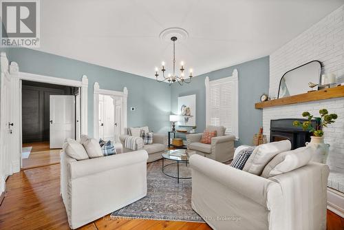 7823 Bickle Hill Road, Hamilton Township, ON - Indoor Photo Showing Living Room With Fireplace