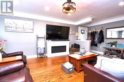 3 Pleasant Avenue, Hamilton, ON - Indoor Photo Showing Living Room With Fireplace