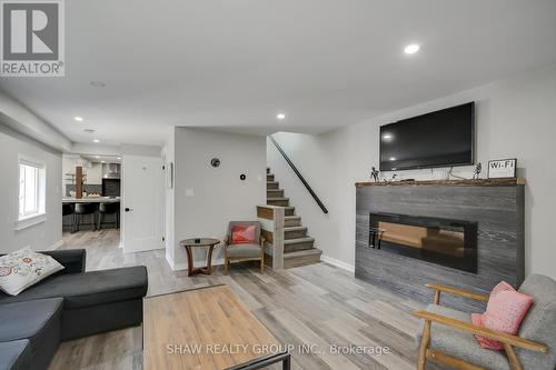 1258 Dwight Beach Road, Lake Of Bays, ON - Indoor Photo Showing Living Room With Fireplace