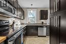 717 Dufferin Avenue, Saskatoon, SK  - Indoor Photo Showing Kitchen With Upgraded Kitchen 