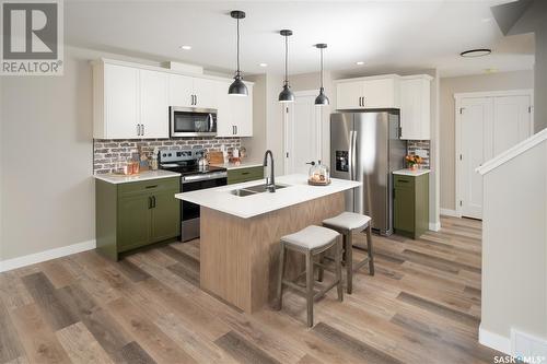 2960 Welby Way, Regina, SK - Indoor Photo Showing Kitchen With Double Sink With Upgraded Kitchen