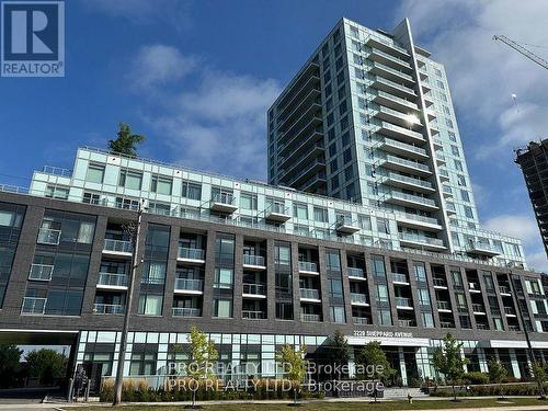 516 - 3220 Sheppard Avenue E, Toronto, ON - Outdoor With Balcony With Facade