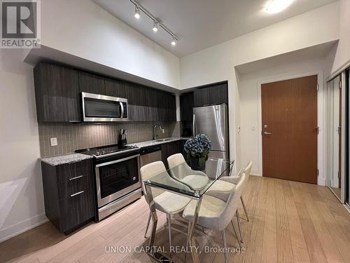 204 - 20 Shore Breeze Drive, Toronto, ON - Indoor Photo Showing Kitchen With Upgraded Kitchen