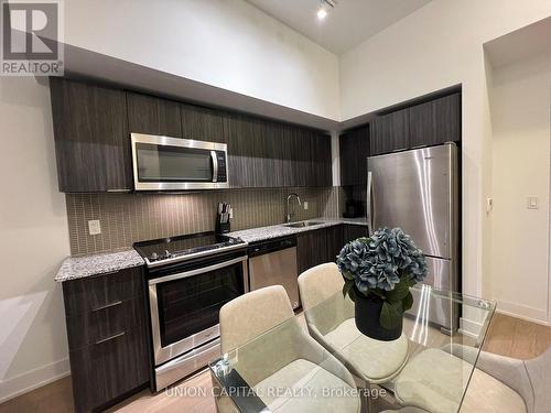 204 - 20 Shore Breeze Drive, Toronto, ON - Indoor Photo Showing Kitchen With Upgraded Kitchen