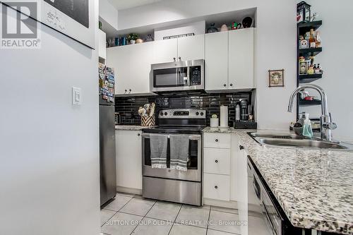 207 - 1359 Rathburn Road E, Mississauga, ON - Indoor Photo Showing Kitchen With Stainless Steel Kitchen With Double Sink