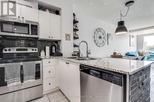 207 - 1359 Rathburn Road E, Mississauga, ON - Indoor Photo Showing Kitchen With Stainless Steel Kitchen With Double Sink With Upgraded Kitchen