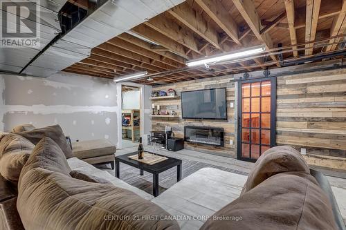 389 Mckeon Avenue, London, ON - Indoor Photo Showing Basement With Fireplace