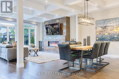 44 Riesling Court, Hamilton, ON - Indoor Photo Showing Dining Room With Fireplace