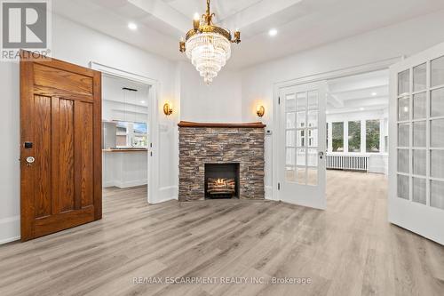 73 Talbot Street N, Norfolk, ON - Indoor Photo Showing Other Room With Fireplace