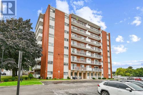 408 - 10 Woodman Drive S, Hamilton, ON - Outdoor With Balcony With Facade