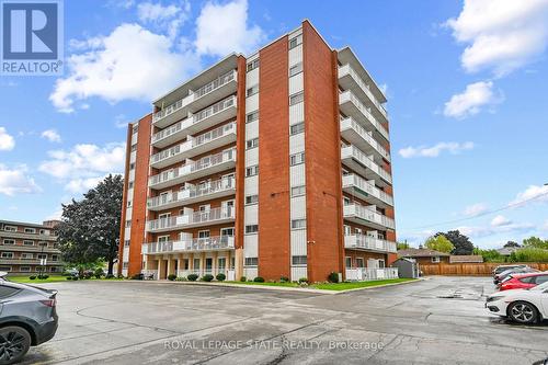 408 - 10 Woodman Drive S, Hamilton, ON - Outdoor With Balcony With Facade