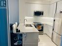 201 - 50 Thomas Riley Road, Toronto, ON  - Indoor Photo Showing Kitchen With Double Sink With Upgraded Kitchen 