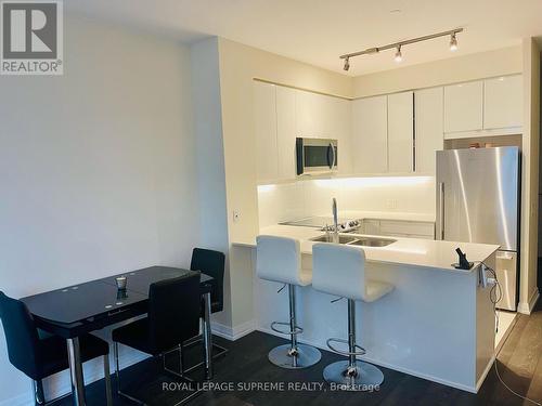 201 - 50 Thomas Riley Road, Toronto, ON - Indoor Photo Showing Kitchen With Double Sink