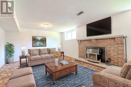 31 Mitchell Avenue, New Tecumseth, ON - Indoor Photo Showing Living Room With Fireplace