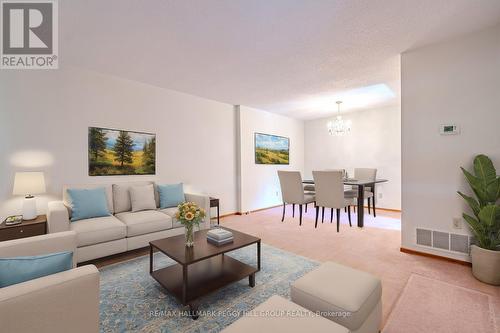 31 Mitchell Avenue, New Tecumseth, ON - Indoor Photo Showing Living Room