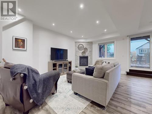 34A Maybourne Avenue, Toronto, ON - Indoor Photo Showing Living Room With Fireplace