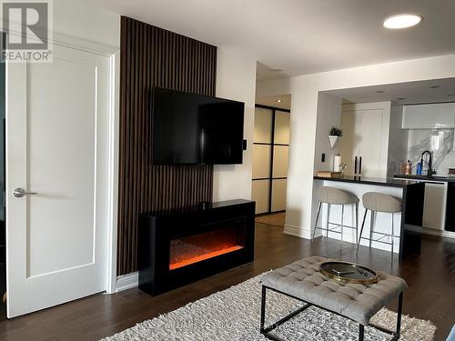 707 - 2091 Hurontario Street, Mississauga, ON - Indoor Photo Showing Living Room With Fireplace