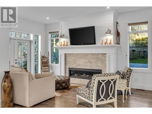 2191 Lavetta Drive, Kelowna, BC - Indoor Photo Showing Living Room With Fireplace