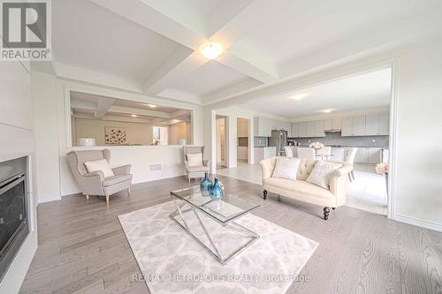 11 Upbound Court, East Gwillimbury, ON - Indoor Photo Showing Living Room With Fireplace