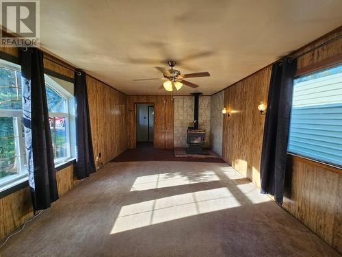 9916 Adams Street, Fort St. John, BC - Indoor Photo Showing Other Room With Fireplace