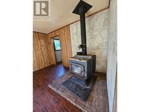 9916 Adams Street, Fort St. John, BC - Indoor Photo Showing Other Room With Fireplace