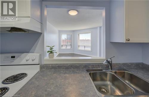 10 Ellen Street E Unit# 803, Kitchener, ON - Indoor Photo Showing Kitchen With Double Sink