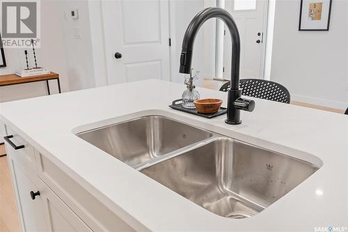 1308 14Th Street E, Saskatoon, SK - Indoor Photo Showing Kitchen With Double Sink