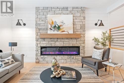 1308 14Th Street E, Saskatoon, SK - Indoor Photo Showing Living Room With Fireplace