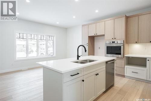 1308 14Th Street E, Saskatoon, SK - Indoor Photo Showing Kitchen With Double Sink