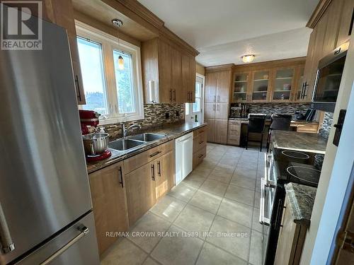 39 Houle Street, Hearst, ON - Indoor Photo Showing Kitchen With Double Sink