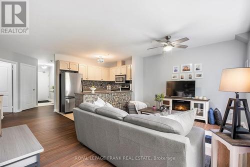 303 - 112 Simcoe Road, Bradford West Gwillimbury (Bradford), ON - Indoor Photo Showing Living Room