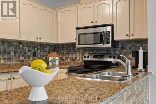 303 - 112 Simcoe Road, Bradford West Gwillimbury (Bradford), ON - Indoor Photo Showing Kitchen With Double Sink