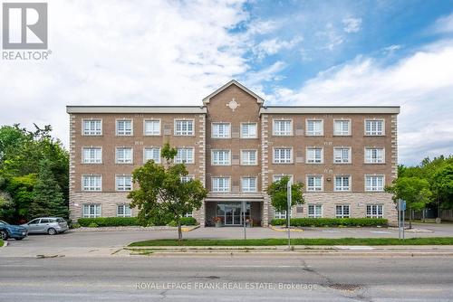 303 - 112 Simcoe Road, Bradford West Gwillimbury (Bradford), ON - Outdoor With Facade