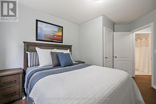 303 - 112 Simcoe Road, Bradford West Gwillimbury (Bradford), ON - Indoor Photo Showing Bedroom