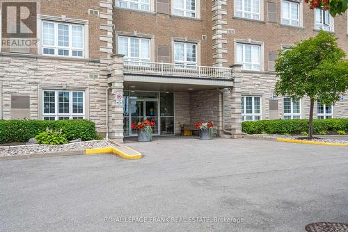 303 - 112 Simcoe Road, Bradford West Gwillimbury (Bradford), ON - Outdoor With Balcony With Facade